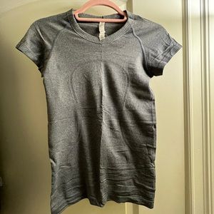 Lululemon, great athletic shirt in a size 4